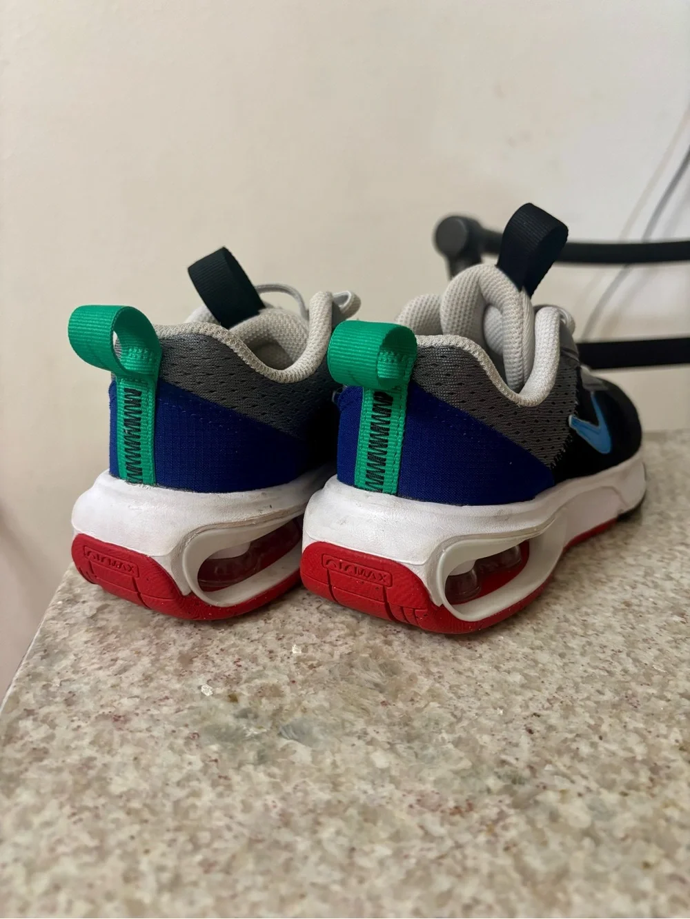 Nike Kids Black Sneakers with Blue Swoosh and Gray Accents